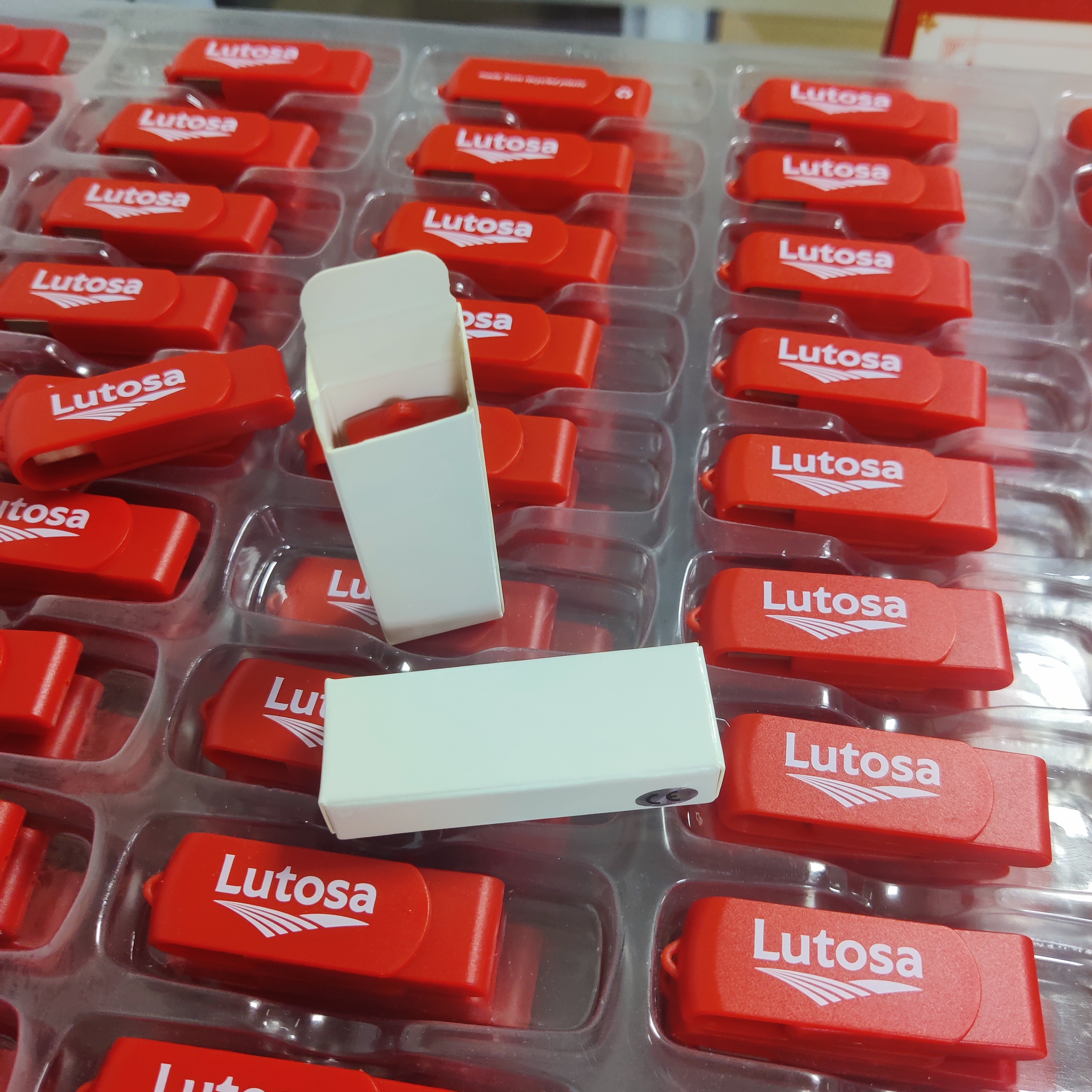 Red Plastic Swivel Memory Sticks as promotional corporate gift